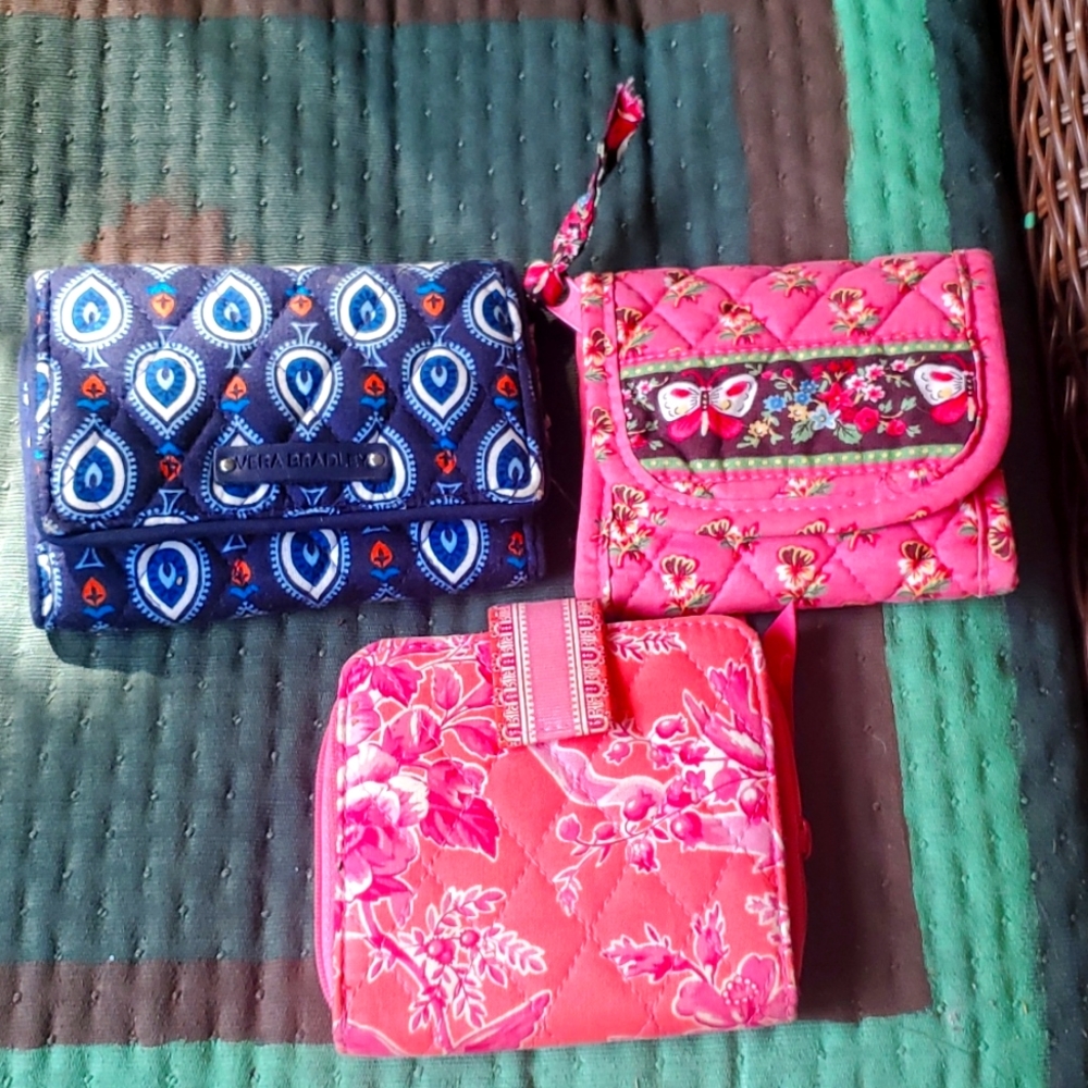 Three Vera Bradley Wallets, one navy pattern and 2 pink pattern
